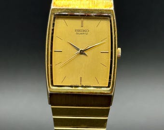 Vintage Seiko 8Y21-5069 Gold Tone Rectangular Case Tank Style Men’s Dress Quartz Watch