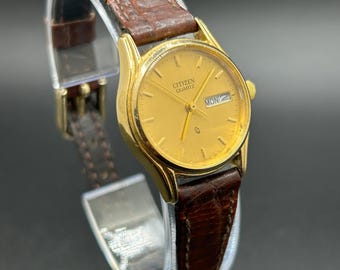 Vintage Citizen 6000-S19970 Gold Tone Day Date Brown Leather Strap Women’s Quartz Watch