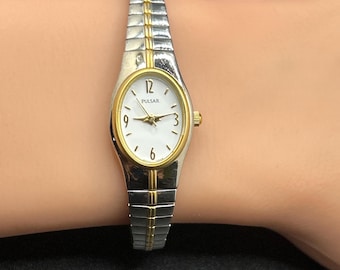 Caravelle by Bulova Two-tone Oval Champagne Dial Expansion  display picture 2
