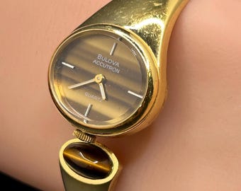 Vintage Bulova Accutron Tiger Eye Style Dial Cuff Bangle Gold Tone Women’s Quartz Statement Wristwatch