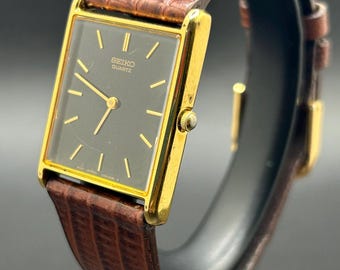Vintage Seiko Quartz V700-5K30 Tank Style Gold Tone Men’s Watch, Black Dial, Classic Dress Watch