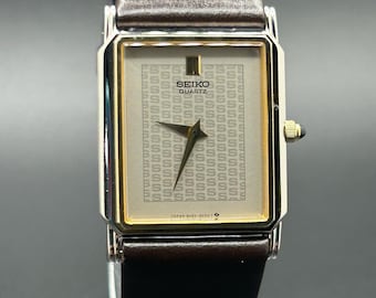 Vintage 1980s Seiko Quartz 9020-5029 Textured Monogram Dial Cabochon Crown Tank Style Men’s Dress Watch
