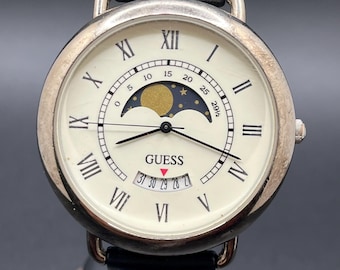 Reloj GUESS Moonphase 1996 de cuarzo japonés vintage para hombre, con fecha, números romanos y correa negra