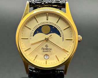 Vintage Armitron Moonphase Mens Gold Tone Quartz Watch With Date Feature Classic Dress Watch 31.5mm