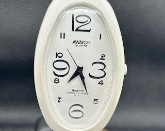 Reloj de cuarzo unisex con esfera ovalada Armitron Awatch vintage