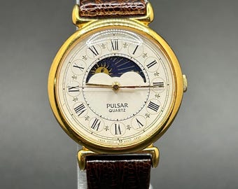 Vintage Pulsar By Seiko Moonphase Celestial Sun Moon Gold Tone Roman Numeral Dial Hirsch Lizard Brown Strap Quartz Women’s Dress Watch