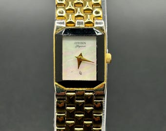 Reloj de cuarzo para mujer Citizen Elegance 5421-S17764, vintage, rectangular, tono dorado, esfera de nácar.