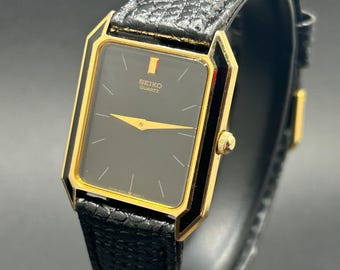 Vintage Seiko Tank Style 6530-5589 Men’s Gold Tone Quartz Black Dial Rectangular Dress Watch