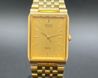 Reloj rectangular de cuarzo Seiko SX Tank V701-5K40 para hombre, tono dorado, vintage y raro.