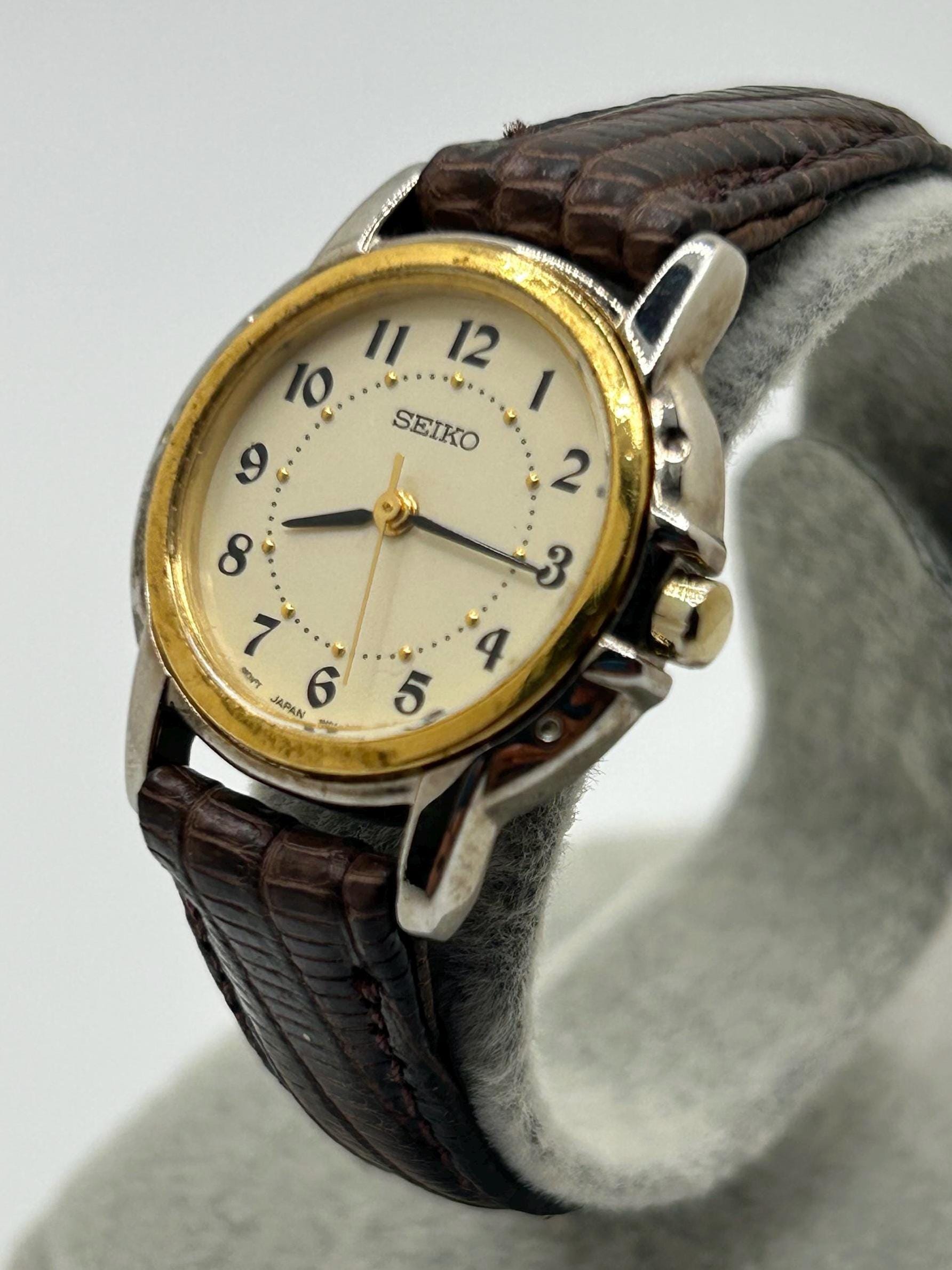 Vintage Seiko Women's Two-tone Gold Bezel Silver Case 1N01-0J09