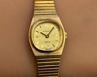 Reloj de cuarzo vintage Bucherer dorado para mujer
