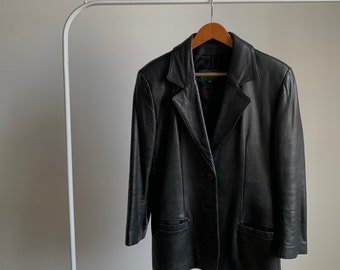 Minimalist 90s black leather blazer by Danier in size M