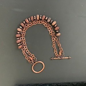Copper chain and beads twisted bracelet
