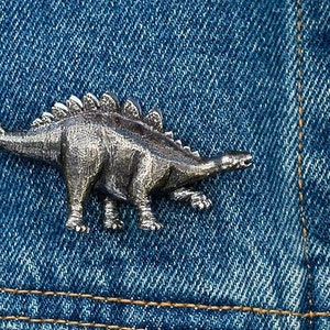A Savvy Stegosaurus brooch