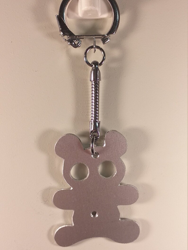 recycled aluminium keyrings cut and engraved by hand