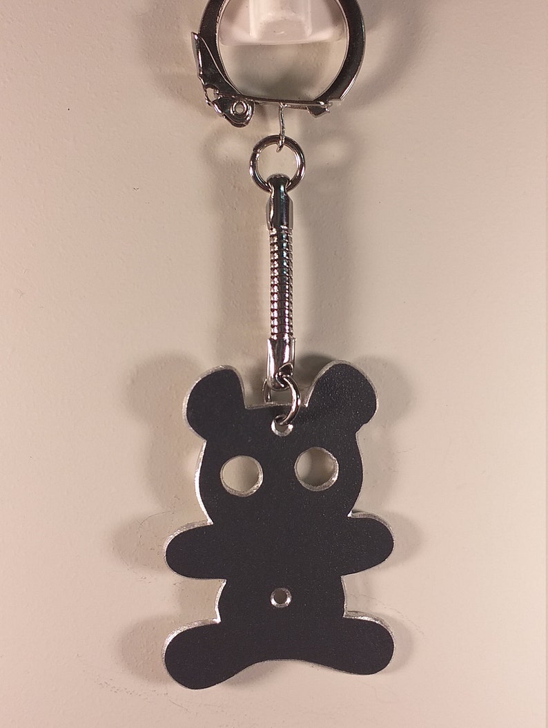recycled aluminium keyrings cut and engraved by hand