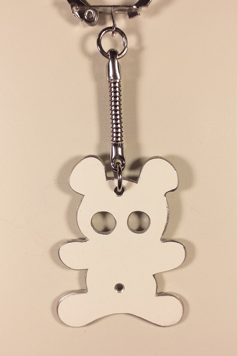 recycled aluminium keyrings cut and engraved by hand