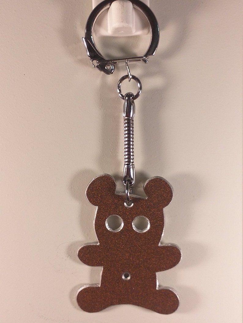 recycled aluminium keyrings cut and engraved by hand