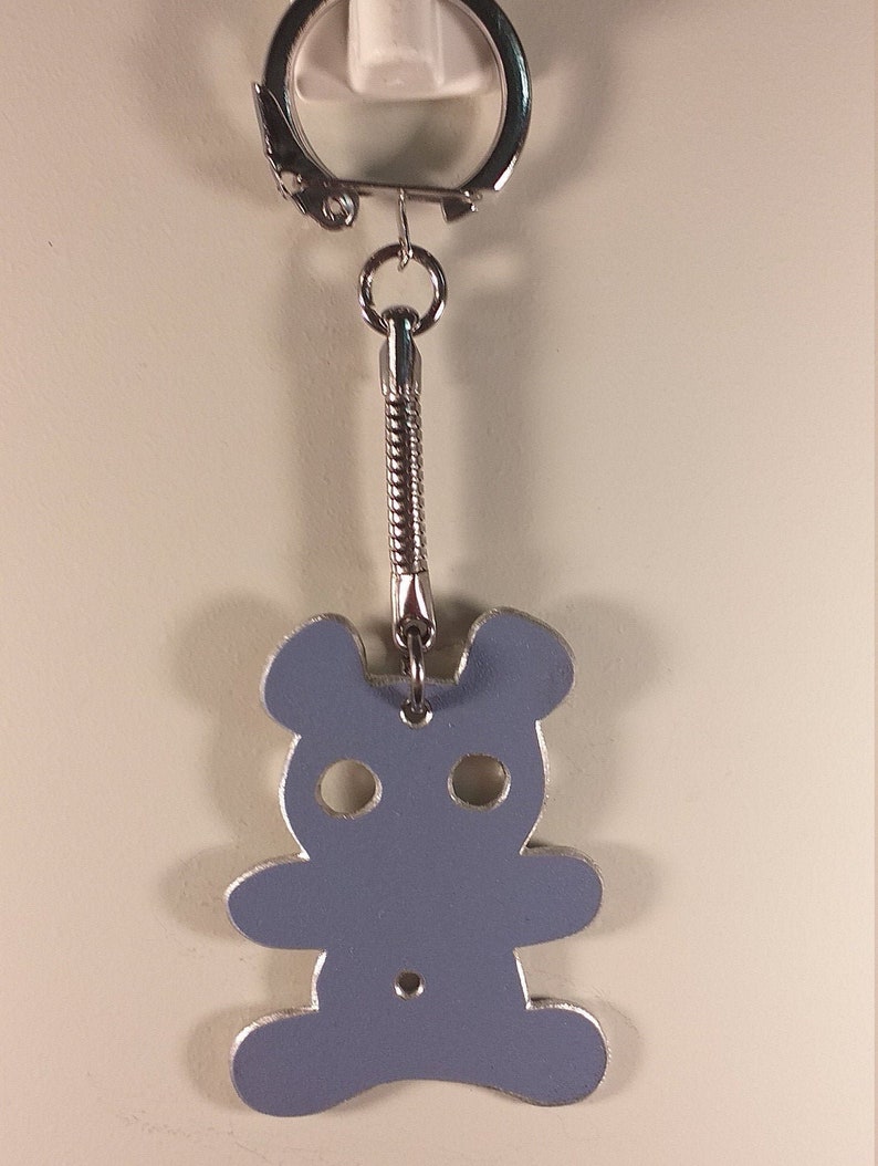 recycled aluminium keyrings cut and engraved by hand