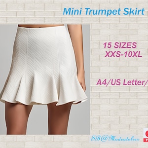 May include: A white mini trumpet skirt with a textured pattern and a flared hem. The skirt is displayed on a person. Text on the image reads "Mini Trumpet Skirt" and "15 Sizes XXS-10XL".