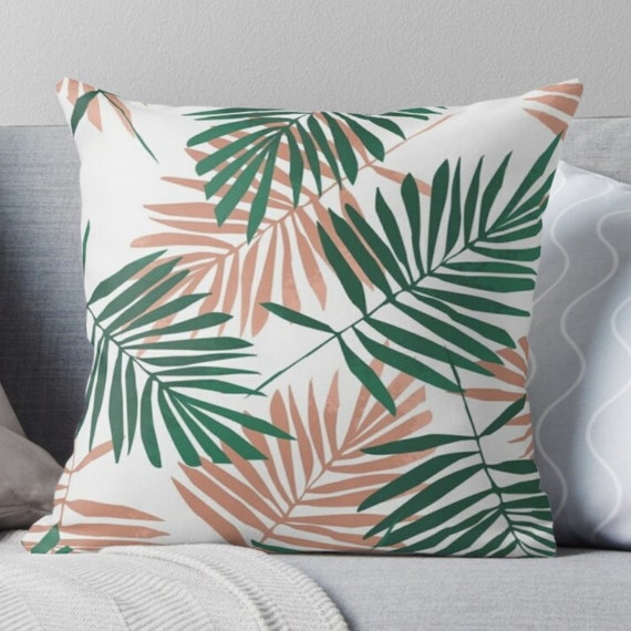 throw pillows with palm leaves