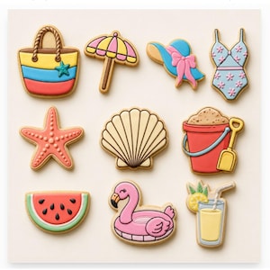 May include: A set of 10 Summer Essentials cookies featuring a beach bag, umbrella, sun hat, swimsuit, starfish, seashell, sand bucket with shovel, watermelon slice, flamingo float, and a lemonade drink with text Summer Essentials - Set of 10 and *Digital STL Files*