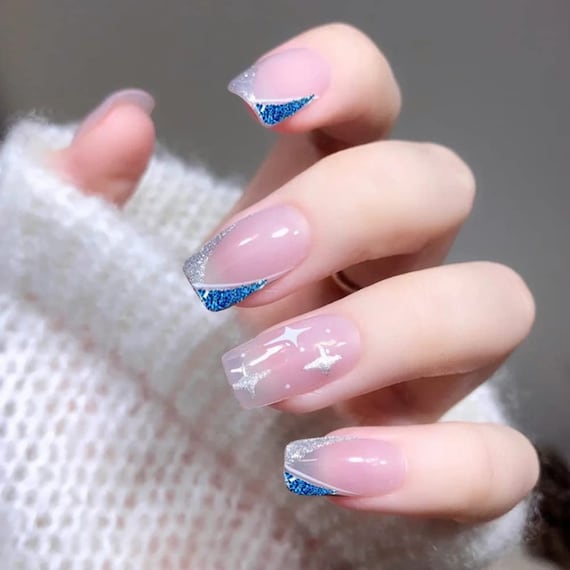 690+ Blue Nails Stock Photos, Pictures & Royalty-Free Images - iStock |  Classic blue nails, Light blue nails, Pastel blue nails