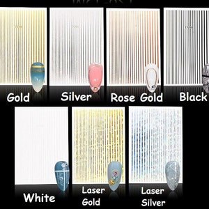May include: Assortment of nail art strips in various colors, including gold, silver, rose gold, black, white, laser gold, and laser silver. The strips are arranged in rows on a white background.