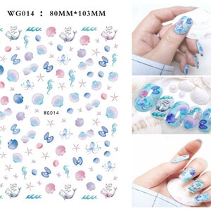 May include: A sheet of nail art stickers with a nautical theme. The stickers feature seashells, starfish, seahorses, an octopus, and a whale with the text "I will be always love you".