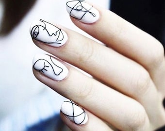 抽象的な顔のネイルアートデカール：ボヘミアンラインアートステッカー