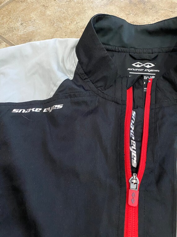 snake eyes golf jacket