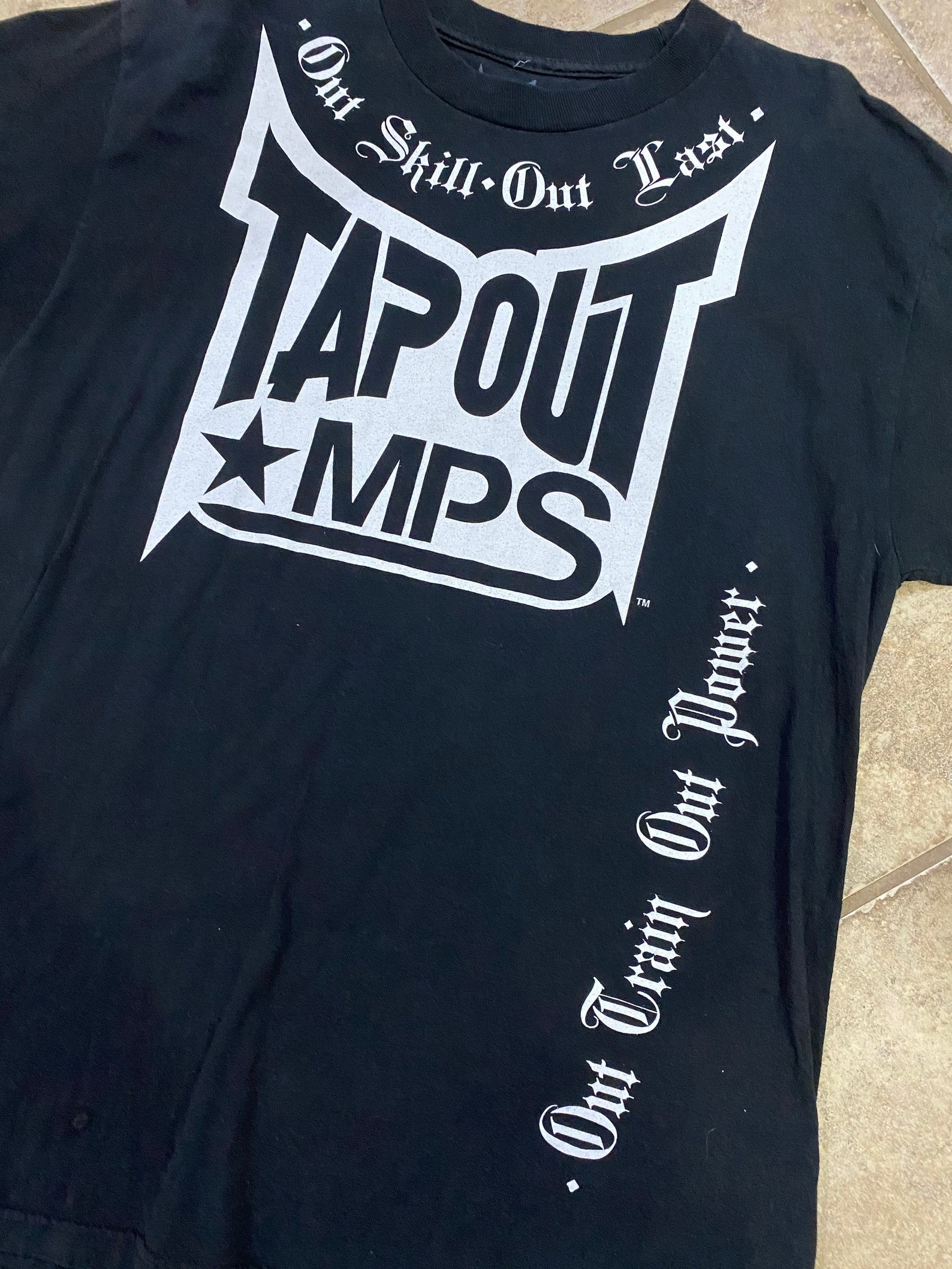 black tapout shirt
