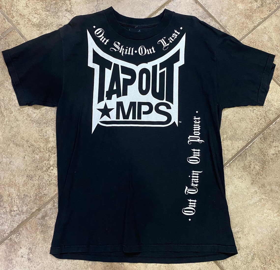 black tapout shirt