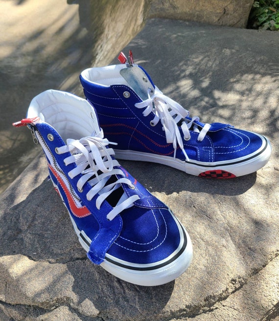 all red sk8 hi vans