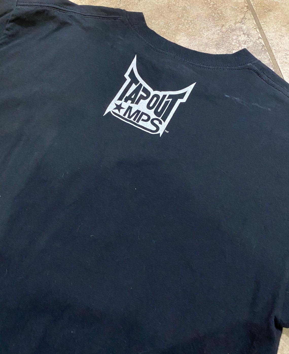 black tapout shirt