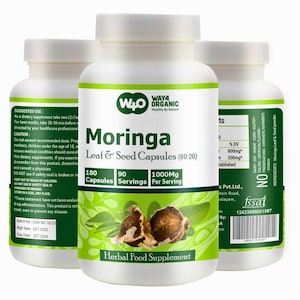 May include: Three white plastic bottles of Way4 Organic Moringa Leaf & Seed Capsules. The label features green accents, text stating 180 capsules, 90 servings, 1000mg per serving, and an illustration of moringa seeds and leaves.