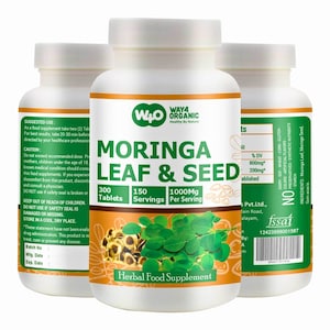 May include: Three white supplement bottles with orange and green labels. The labels read "MORINGA LEAF & SEED" and "Herbal Food Supplement." The bottles contain 300 tablets, 150 servings, and 1000mg per serving. The brand name is "W4O ORGANIC."