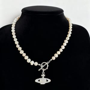 Pearl Orbit - Pearl Style Beaded Necklace with Silver Toggle Clasp and Orb Pendant