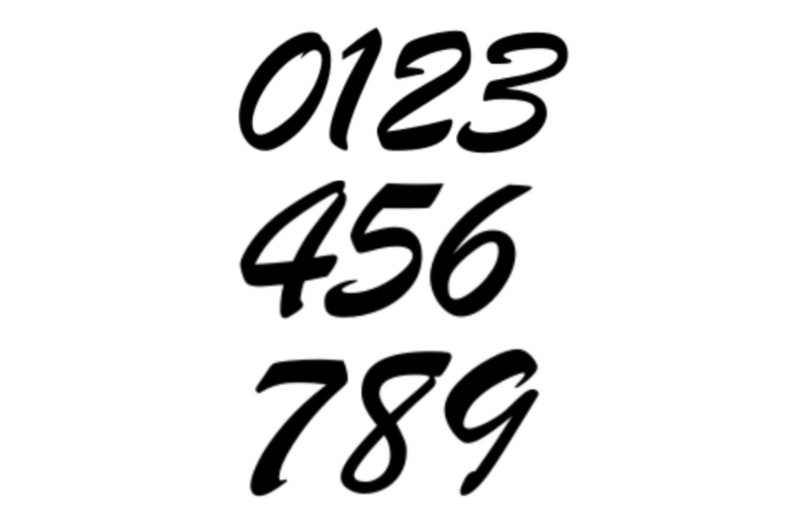 May include: A set of black handwritten numbers from 0 to 9. The numbers are written in a bold, stylized font.