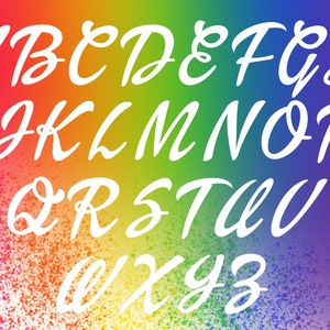May include: A colorful rainbow background with a white handwritten alphabet in a cursive font.