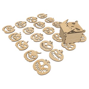 May include: A wooden box with a hinged lid, decorated with a carved pumpkin face. The box is surrounded by 16 individual wooden pumpkin cutouts, each with a different carved face.