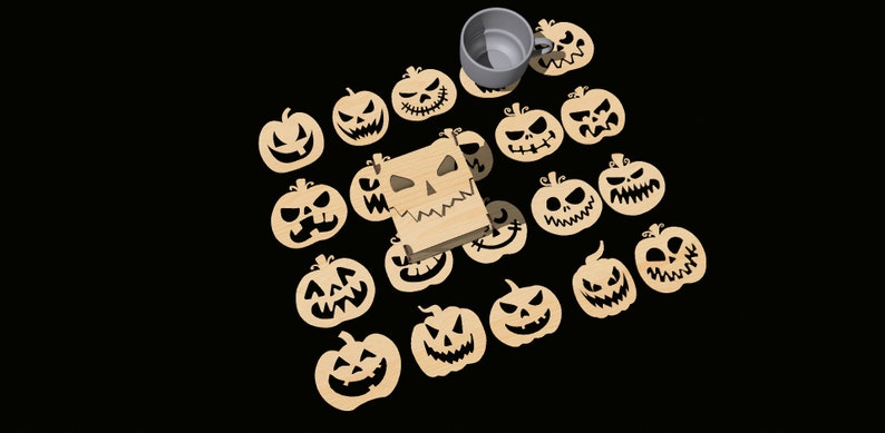 May include: A set of 16 wooden pumpkin coasters with carved jack-o'-lantern faces. The coasters are arranged in a circle around a wooden box with a carved jack-o'-lantern face. A gray mug is sitting on top of one of the coasters.