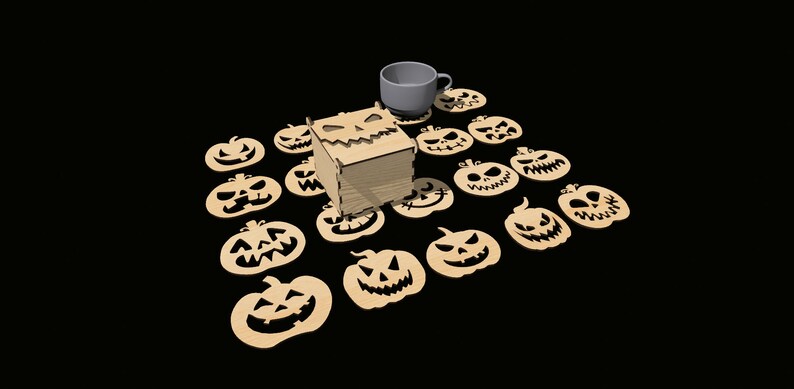 May include: A set of 15 wooden pumpkin-shaped coasters with carved jack-o'-lantern faces. A wooden box with a carved jack-o'-lantern face sits in the center of the coasters. A gray ceramic mug sits on top of the box.