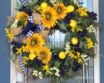 Sunflower and lemon wreath with blue and burlap accent.