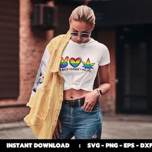 May include: A white t-shirt featuring a rainbow peace sign, heart, and marijuana leaf design. The text "Peace - Love - Pride" is printed below the design.