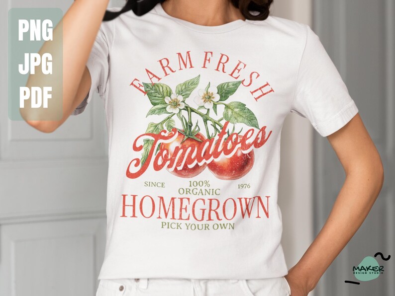 May include: White t-shirt with a red, green, and white graphic design that says "Farm Fresh Tomatoes" with a vine of tomatoes and leaves. The text also says "Since 1976, 100% Organic, Homegrown, Pick Your Own."