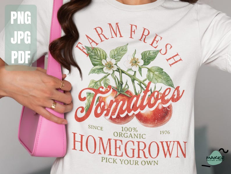 May include: White t-shirt with a red and green graphic design that says "Farm Fresh Tomatoes" with a tomato illustration. The text also says "Since 1976, 100% Organic, Homegrown, Pick Your Own."