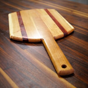 Charcuterie board with handle, cutting board