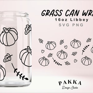 May include: A black and white line drawing of a 16oz glass can wrap design with a pumpkin and leaf pattern. The text "GRASS CAN WRAP" and "16oz Libbey SVG PNG" is included in the image. The text "PAKKA Design Studio" is also included in the image.