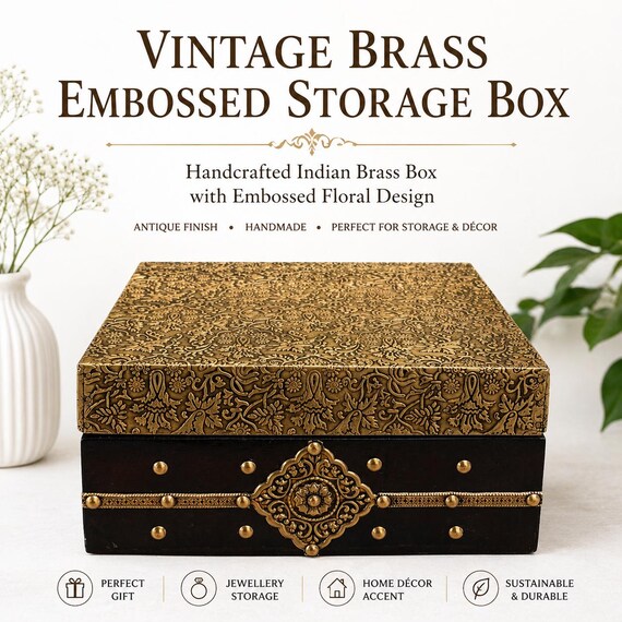 Intricately embossed antique brass floral panels over a wooden box — the kind of piece that looks like it was looted from a maharaja's estate.